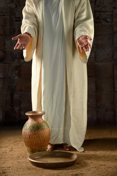 Jesus mit Wasserglas und Pfanne — Stockfoto