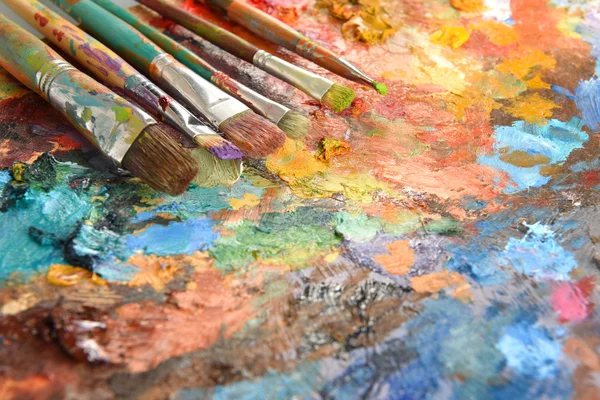Artist Paintbrushes Over Palette — Stock Photo, Image