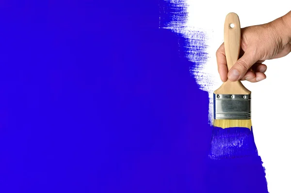 青い壁を描く — ストック写真