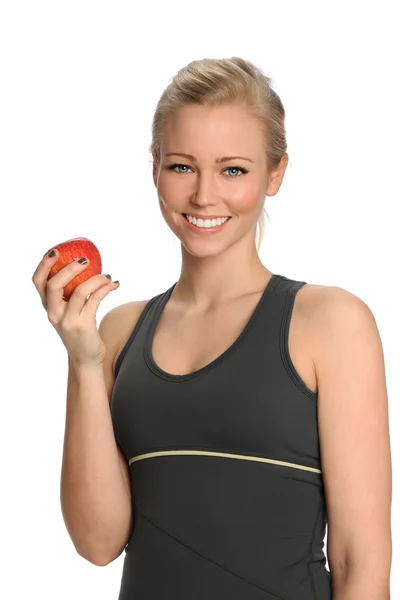 Elma tutan genç kadın — Stok fotoğraf