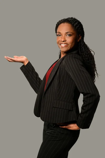 Woman Presenting with Palm Up — Stock Photo, Image