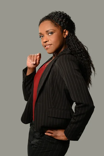 Businesswoman Standing over Gray Background — Stock Photo, Image