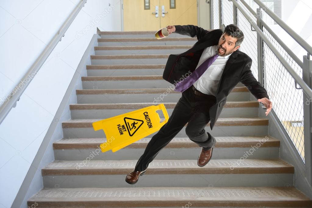Hispanic Businessman Falling on stairs