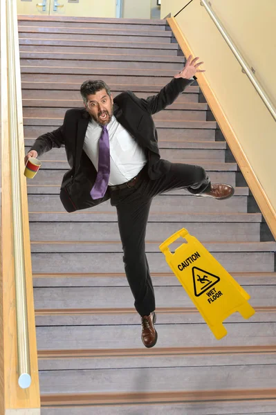 Businessman Falling on Stais — Stock Photo, Image