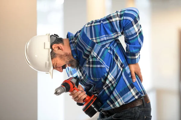 Worker Getting Back Pain Building — Stock Photo, Image