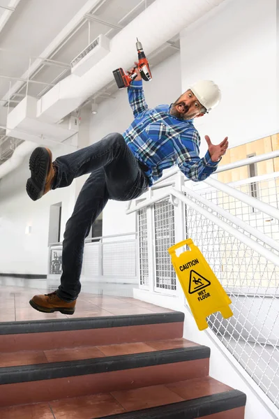 Worker Wearing Hard Hat Falling Stairs Building — Stock Photo, Image
