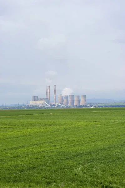 Power plant station in green field in Greece Royalty Free Stock Photos