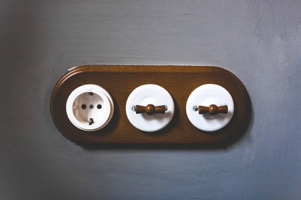 Switches and wall plug in retro style, real estate concept. — Stock Photo, Image