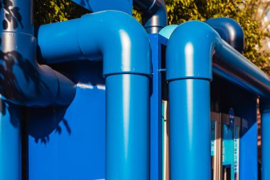 Large blue plastic pipes to transport drinking water