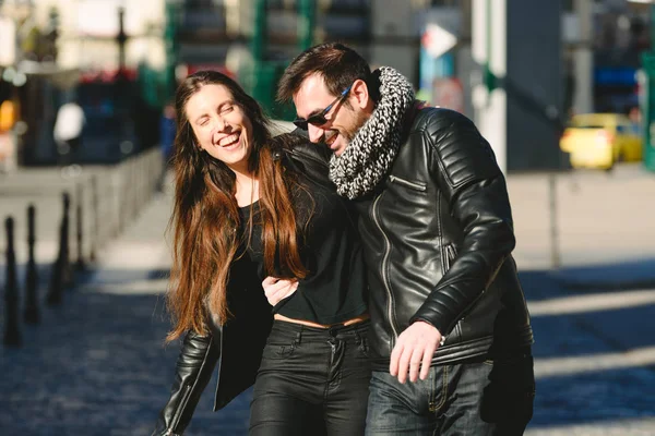 Couple in love walking casually embraced and laughing with loud — 스톡 사진