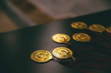 Gold medals for successful people in business who manage to reac