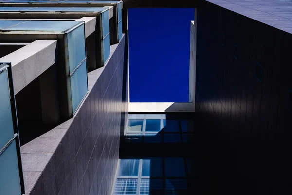 Business office buildings without activity, with calm blue tones, and copy space.