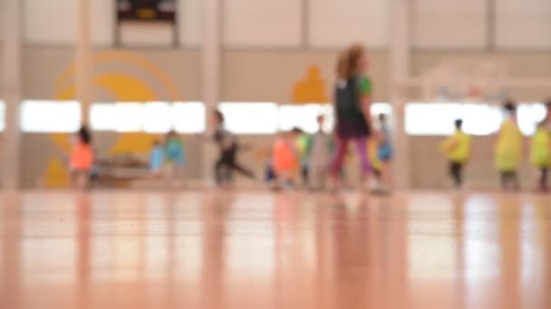 Unfocused Scene Group Children Running Exercising Sports Pavilion School — Stock Video