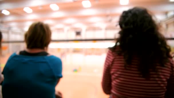 Unfocused Scene Spectators Watching Children Playing Game Sports Field — Stock Video