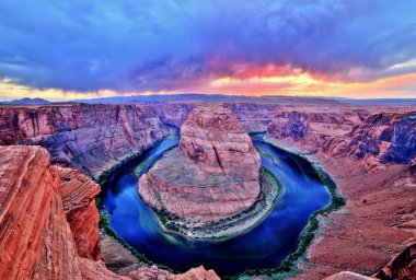Horseshoe Bend on Colorado River at Sunset and Cloudy Weather, Utah clipart