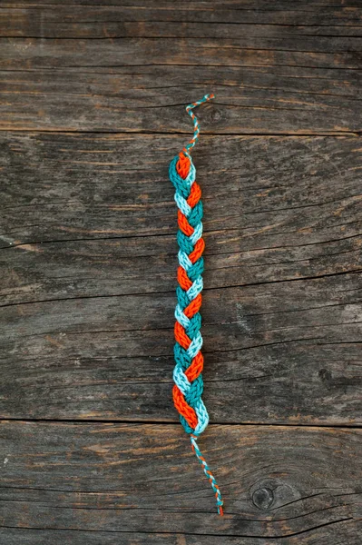 Handmade knitted bracelet — Stock Photo, Image