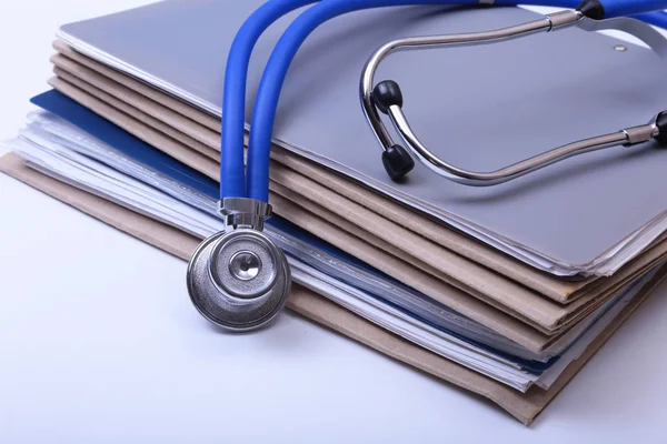 Stethoscope and medical equipment on a light blue background — Stock Photo, Image