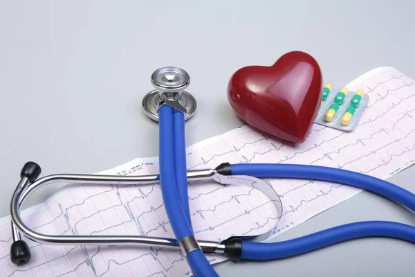 RX prescription, Red heart, asorted pils and a stethoscope on white background — Stock Photo, Image