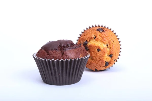 Fresh homemade muffins on white background. Top view. — Stock Photo, Image