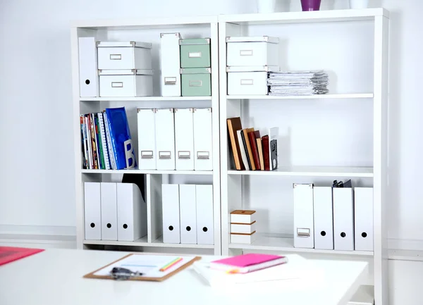 Modern office interior with tables, chairs and bookcases — Stock Photo, Image