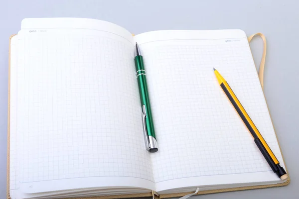 Open Blank Page notebook and pen on white table. — Stock Photo, Image