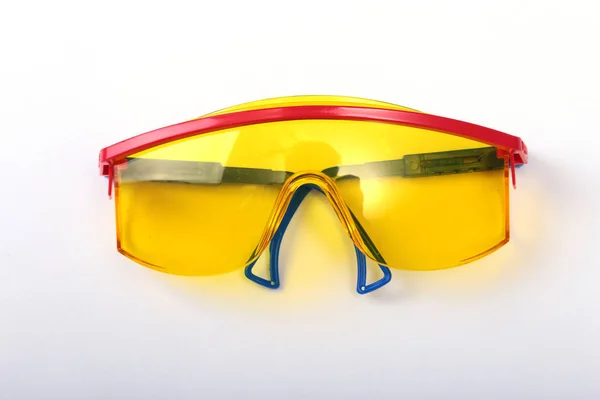 Safety glasses for work. Eye protection during operation on a white background . — Stock Photo, Image