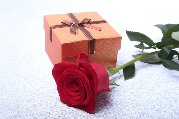 Gift boxes with bow and rose on white background. Decoration. — Stock Photo, Image