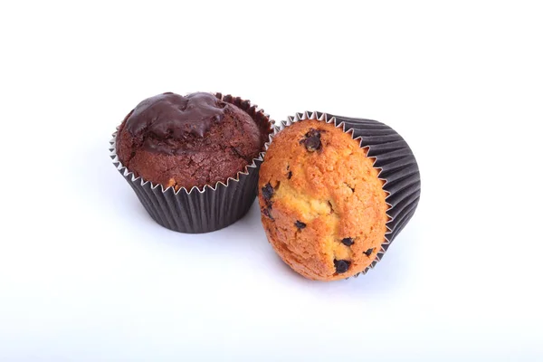 Fresh homemade muffins on white background. Top view. — Stock Photo, Image
