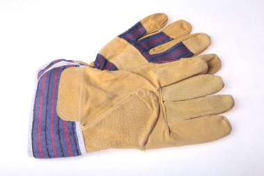 Çift beyaz bir arka plan üzerinde izole koruyucu iş eldiveni.