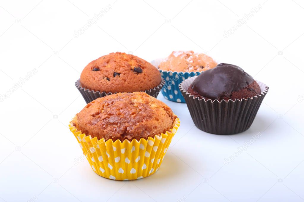 Delicious homemade cupcake with chocolate isolated on white background. Muffins.