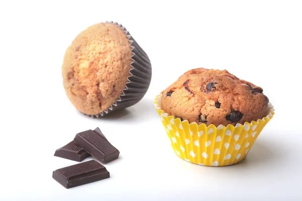 Homemade muffin with raisins and chocolate cupcake. Isolated on white background. selective focus — Stock Photo, Image