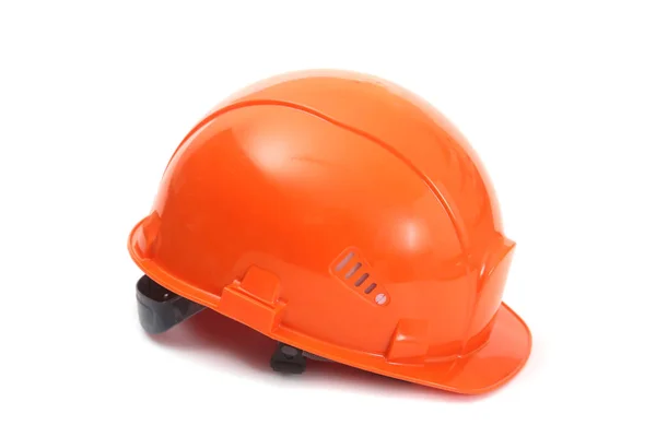 Oranžová čepice izolovaných na bílém pozadí. Bezpečnostní přilba. — Stock fotografie