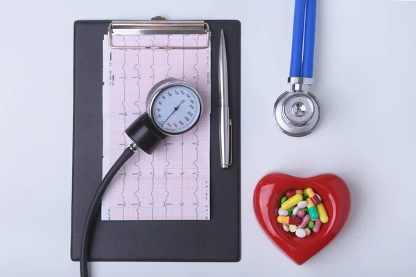 RX prescription, Red heart, asorted pils and a stethoscope on white background — Stock Photo, Image