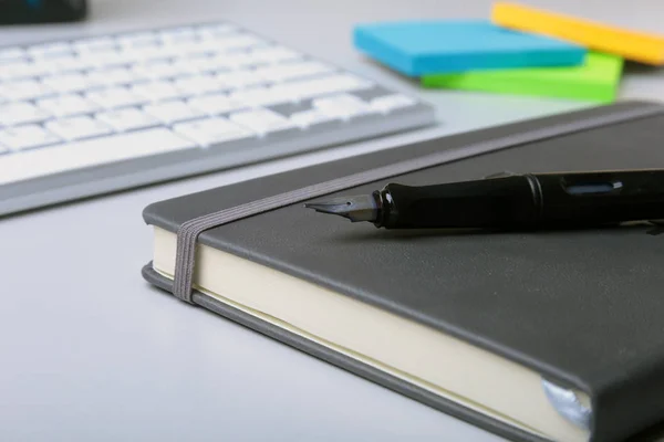 Corporate business desktop with laptop, digital tablet, accessories and work equipment. selective focus.