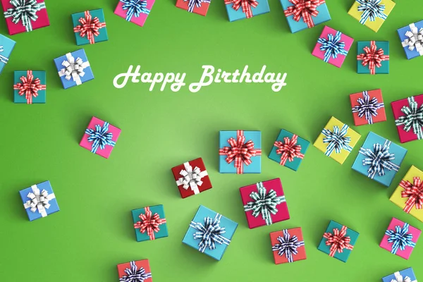Happy birthday and gift box on black background — Stock Photo, Image