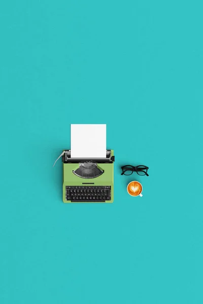 Vintage typywriter with coffee latte and book open on color back — Stock Photo, Image