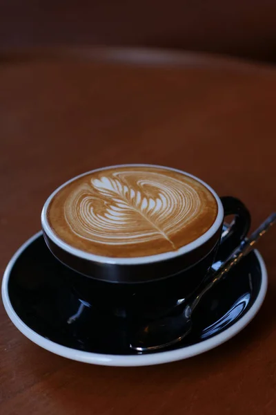 Coffee latte art in coffee shop cafe — Stock Photo, Image