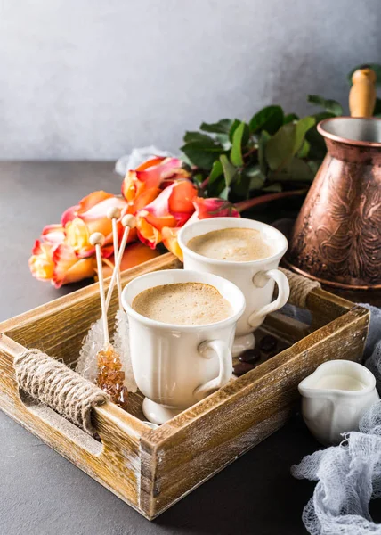 Cup of coffee in vintage wooden tray — Stock Photo, Image