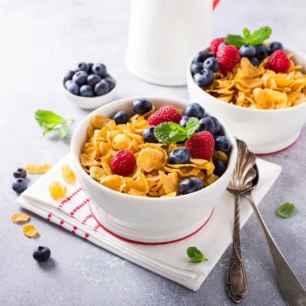 Healthy breakfast with corn flakes and berries