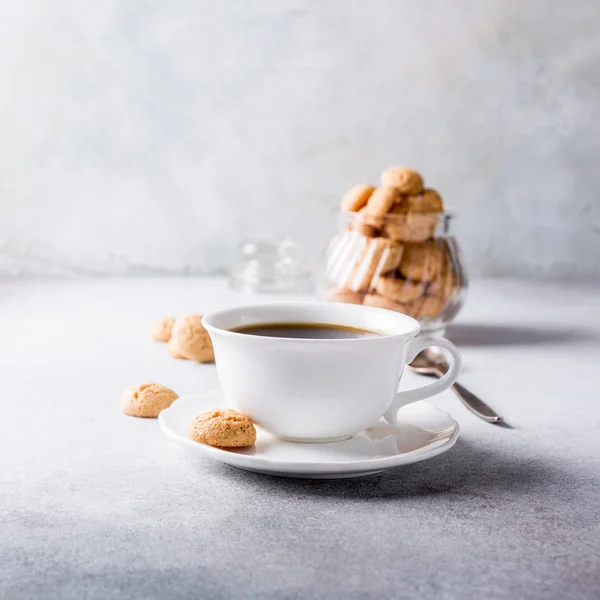 White cup of coffee with amaretti cookies — Stock Photo, Image