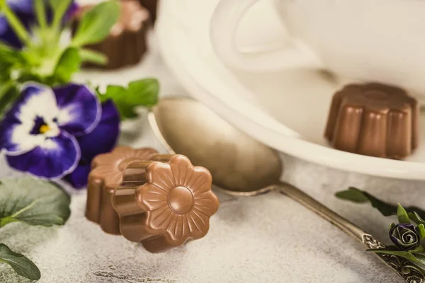 Chocolate candies in flower shape — Stock Photo, Image