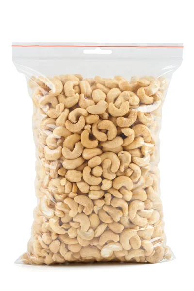 Cashew in plastic zak — Stockfoto