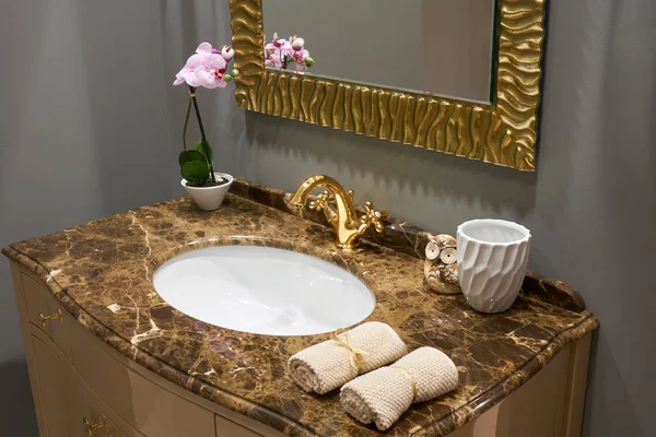 Sink and gold mixer — Stock Photo, Image