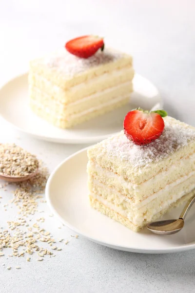 Dessert White Biscuit Cake Cream Coconut Shavings White Plate Spoon — Stock Photo, Image