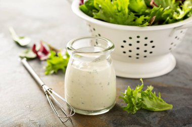 Homemade ranch dressing in a small jar clipart