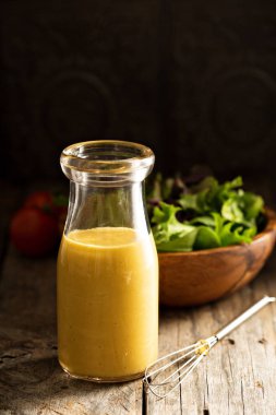 Homemade honey mustard dressing clipart