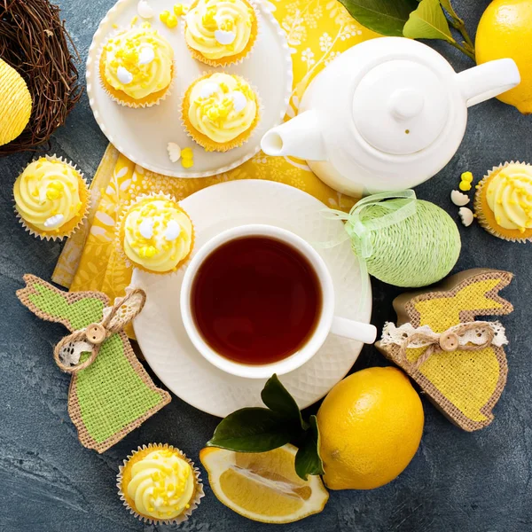 Lemon cupcakes with yellow frosting — Stock Photo, Image