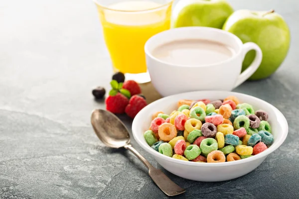 Fruit colorful sweet cereals with juice and cocoa