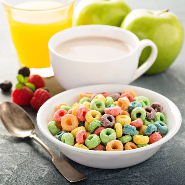 Fruit colorful sweet cereals with juice and cocoa — Stock Photo, Image