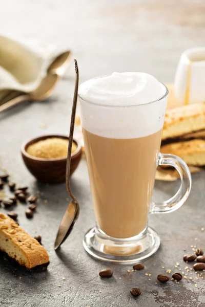 Hot coffee latte with biscotti cookies — Stock Photo, Image